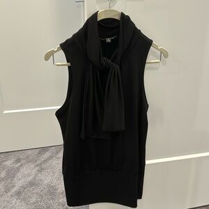 Women’s black sleeveless top with tie neck in size Small.